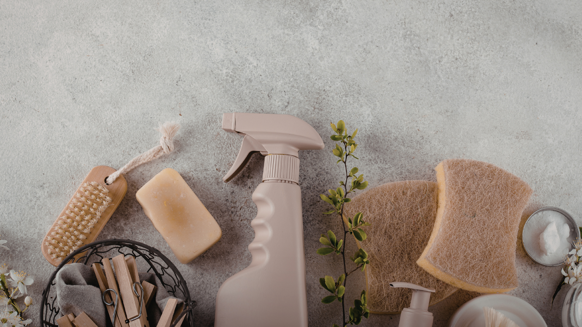 Eco-friendly cleaning tools laid out for a short-term rental turnover, highlighting the standard expected when charging a vacation rental cleaning fee.